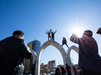 In Raqqa, Damascus Returns as the Rojava Project Recedes