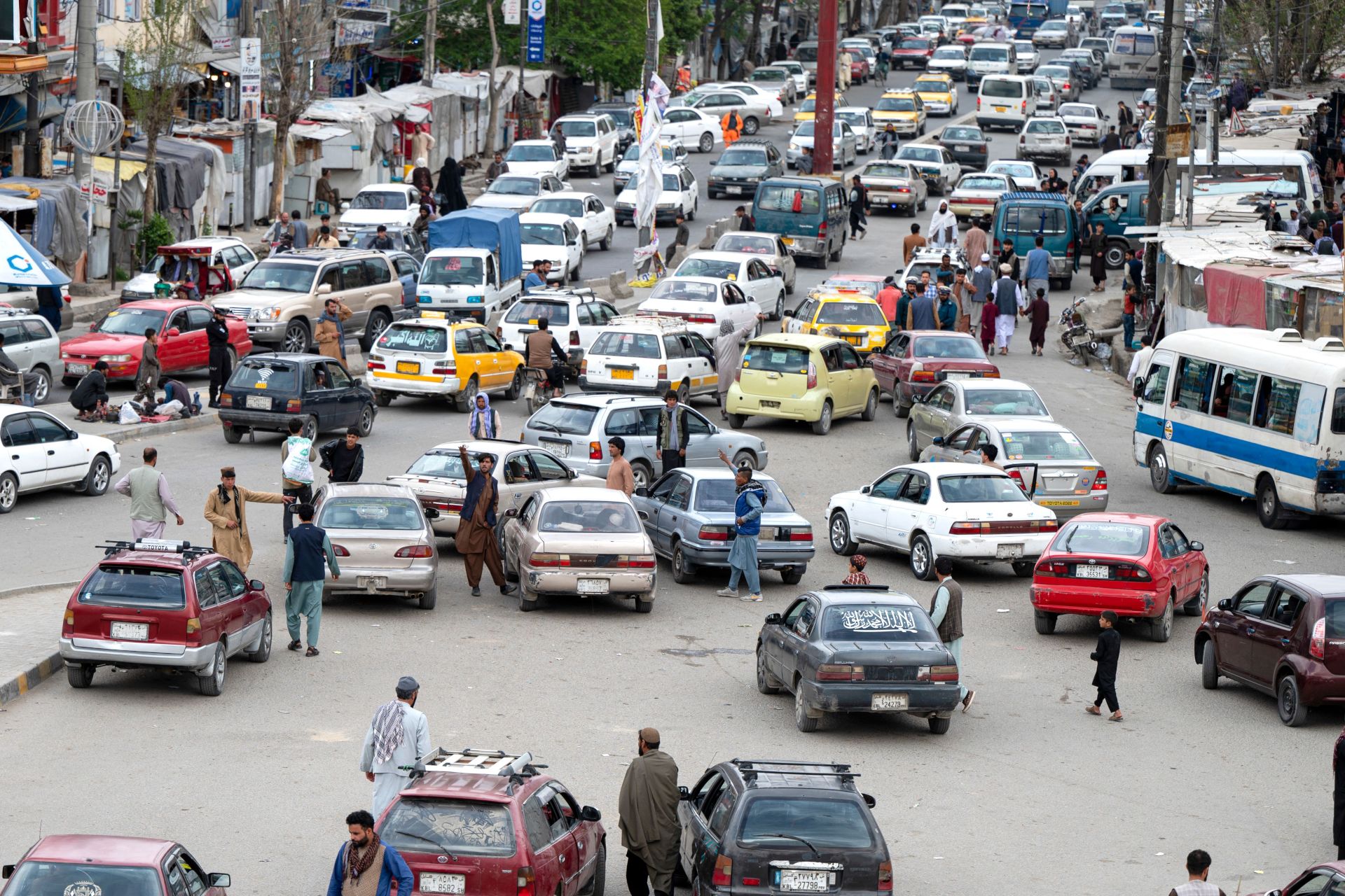 In Afghanistan’s Taxi Industry, the Taliban Show How They Govern
