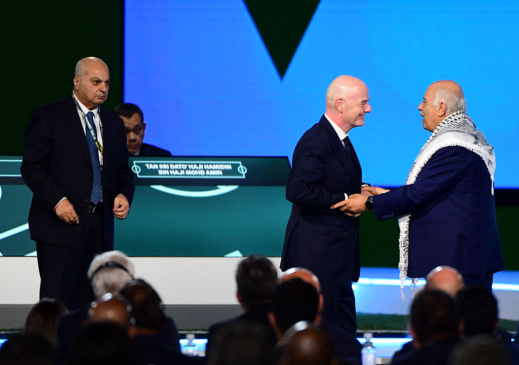 Palestinian Soccer Chief Snubs Israeli Handshake Staged by FIFA’s Infantino